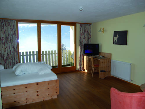 Imagen de la habitación del Hotel Panorama Alpin - Moments. Foto 4