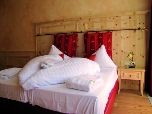 Imagen de la habitación del Hotel Panorama Alpin - Moments. Foto 5