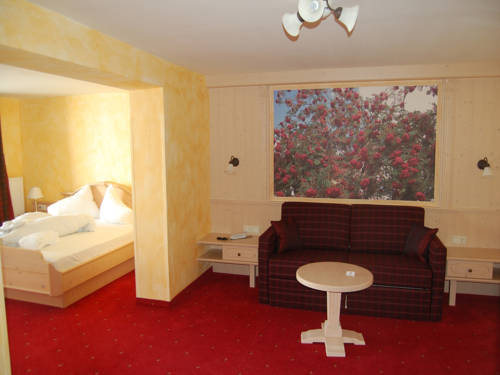 Imagen de la habitación del Hotel Panorama Alpin - Moments. Foto 7