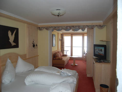 Imagen de la habitación del Hotel Panorama Alpin - Moments. Foto 8