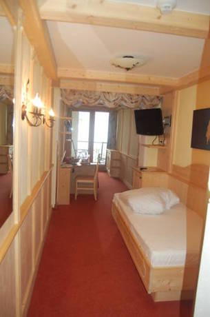 Imagen de la habitación del Hotel Panorama Alpin - Moments. Foto 9