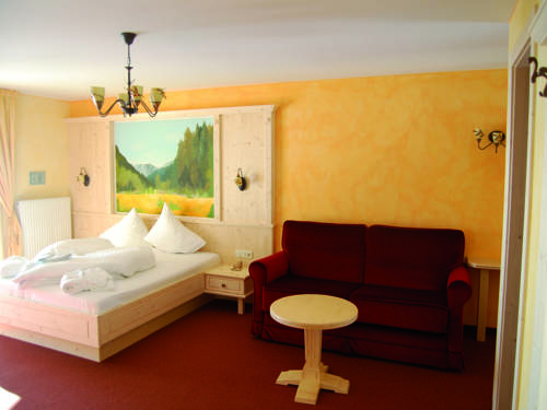 Imagen de la habitación del Hotel Panorama Alpin - Moments. Foto 12