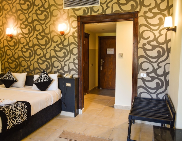 Imagen de la habitación del Hotel Panorama Bungalow Resort El Gouna. Foto 2