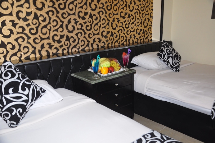 Imagen de la habitación del Hotel Panorama Bungalow Resort El Gouna. Foto 15