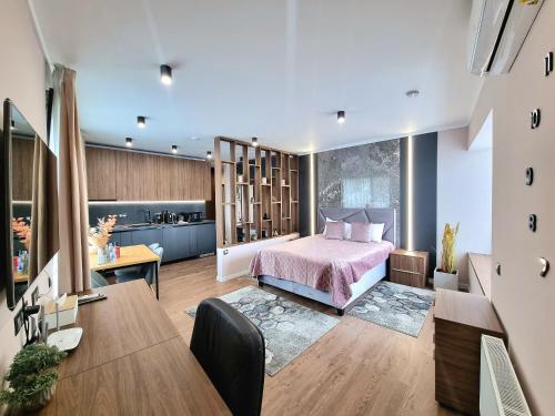Imagen de la habitación del Hotel Panorama Deluxe Aparthotel. Foto 17