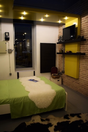 Imagen de la habitación del Hotel Panorama Penthouse and Studios. Foto 4