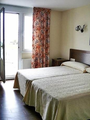 Imagen de la habitación del Hotel Panorama Tapia. Foto 18