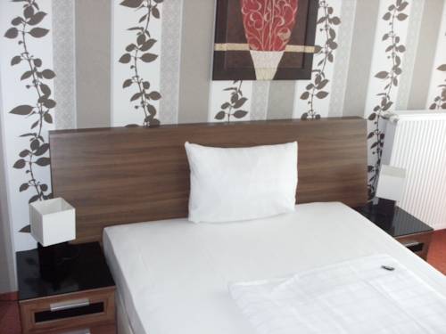 Imagen de la habitación del Hotel Panoramahotel Am Rosengarten. Foto 2