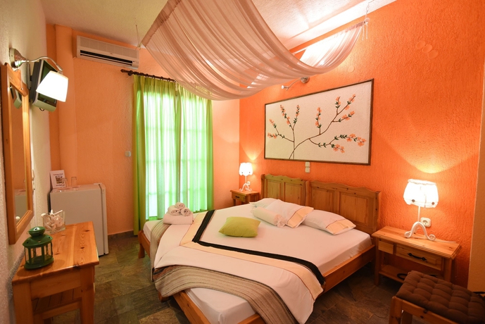 Imagen de la habitación del Hotel Panormos Beach Skopelos. Foto 11