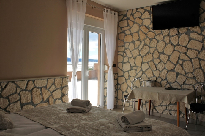 Imagen de la habitación del Hotel Pansion Dalmacija. Foto 12