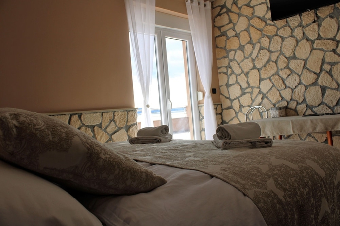 Imagen de la habitación del Hotel Pansion Dalmacija. Foto 14