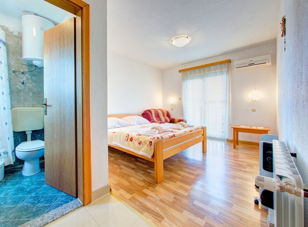 Imagen de la habitación del Hotel Pansion Glory. Foto 9