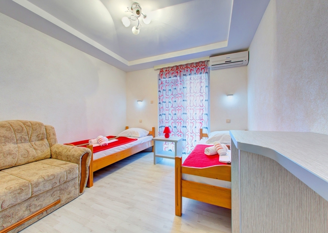 Imagen de la habitación del Hotel Pansion Glory. Foto 10