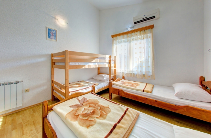 Imagen de la habitación del Hotel Pansion Glory. Foto 13