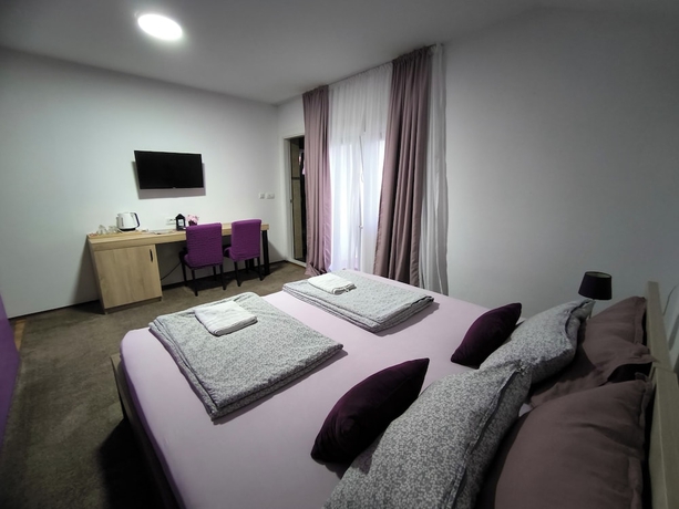 Imagen de la habitación del Hotel Pansion Infinity. Foto 6
