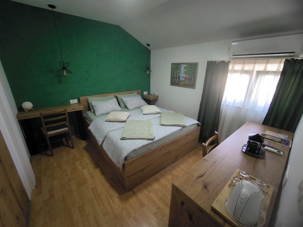 Imagen de la habitación del Hotel Pansion Infinity. Foto 8