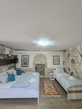 Imagen de la habitación del Hotel Pansion Infinity. Foto 16