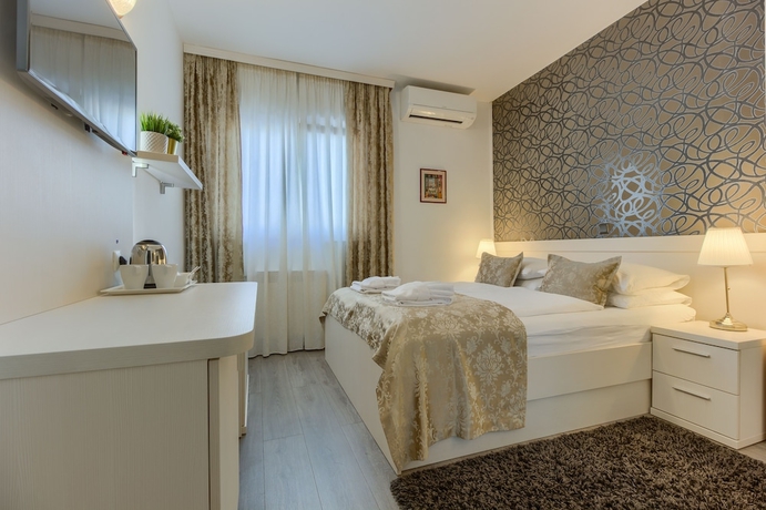 Imagen de la habitación del Hotel Pansion Martin. Foto 15