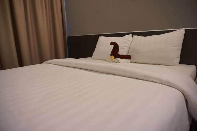 Imagen de la habitación del Hotel Pantes Simpang lima Semarang. Foto 3