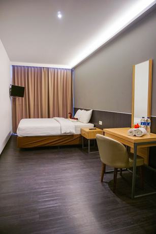 Imagen de la habitación del Hotel Pantes Simpang lima Semarang. Foto 9