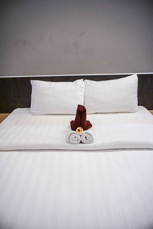 Imagen de la habitación del Hotel Pantes Simpang lima Semarang. Foto 11