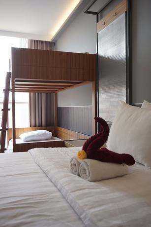Imagen de la habitación del Hotel Pantes Simpang lima Semarang. Foto 13