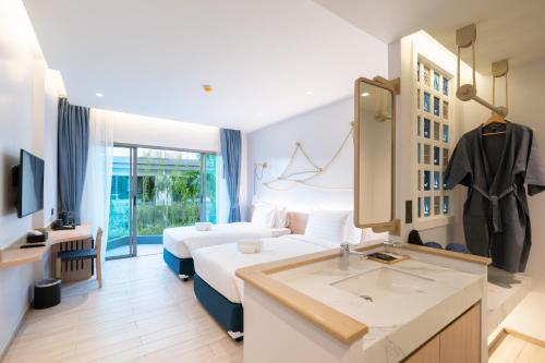 Imagen general del Hotel Panwaburi Beachfront Resort. Foto 7