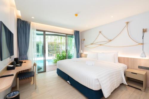 Imagen general del Hotel Panwaburi Beachfront Resort. Foto 10