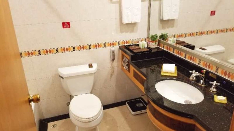 Imagen de la habitación del Hotel Panyu Guest House. Foto 10