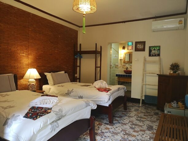 Imagen de la habitación del Hotel Pao Come Boutique House. Foto 16