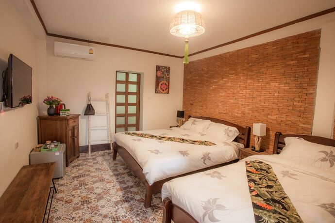 Imagen de la habitación del Hotel Pao Come Boutique House. Foto 28