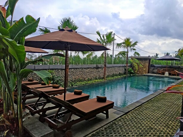 Imagen de la piscina del Hotel Paon Desa Ubud. Foto 31