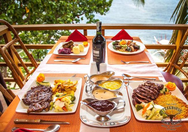Imagen del bar/restaurante del Hotel Papa Freds Beach Resort. Foto 5