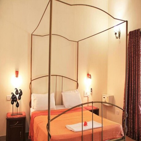 Imagen de la habitación del Hotel Papa Jolly Eco Resort - Near Morjim Beach. Foto 21