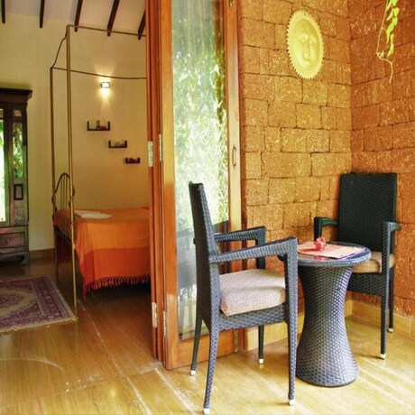 Imagen de la habitación del Hotel Papa Jolly Eco Resort - Near Morjim Beach. Foto 23