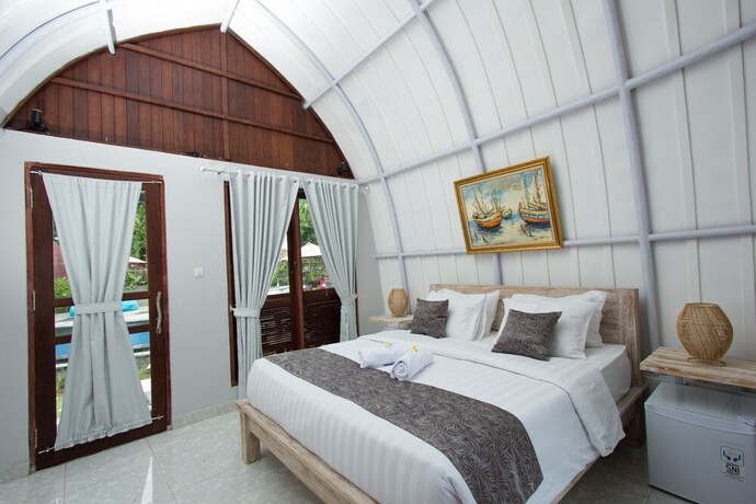 Imagen de la habitación del Hotel Papa Sun Villas. Foto 23