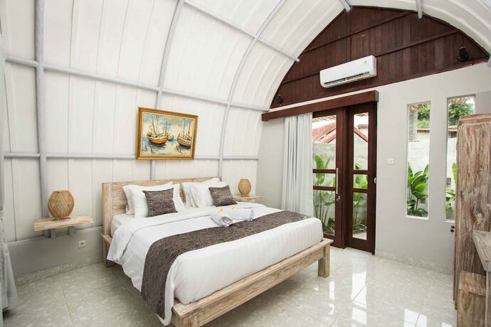 Imagen de la habitación del Hotel Papa Sun Villas. Foto 26