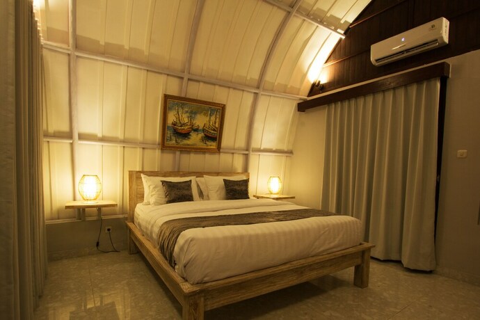 Imagen de la habitación del Hotel Papa Sun Villas. Foto 30
