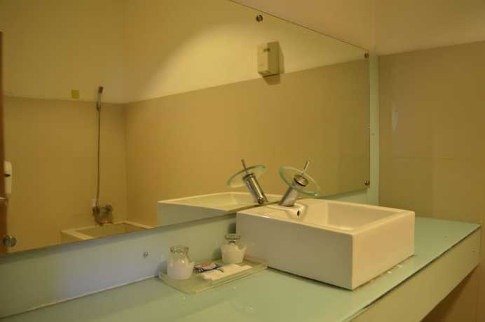 Imagen de la habitación del Hotel Papaho. Foto 13