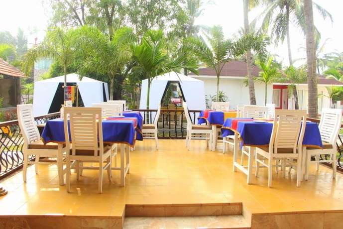 Imagen del bar/restaurante del Hotel Paparazzi Resort. Foto 3