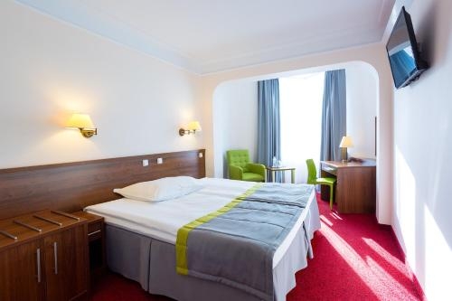 Imagen de la habitación del Hotel Papuga Park. Foto 6