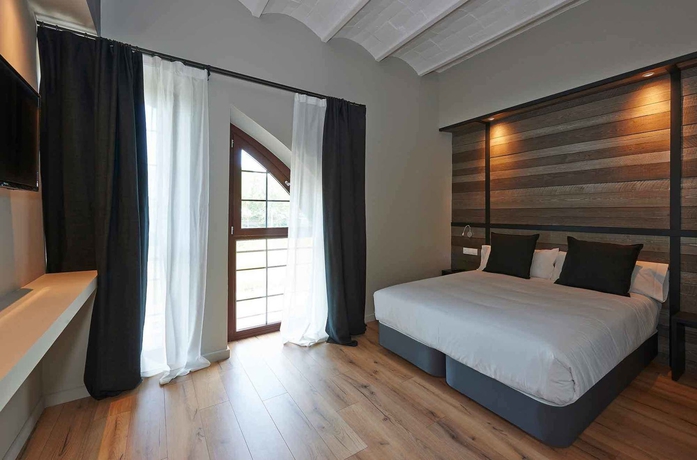 Imagen de la habitación del Hotel Parada Puigcerdà. Foto 8