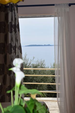Imagen de la habitación del Hotel Paradise Apartments, Corfu. Foto 17