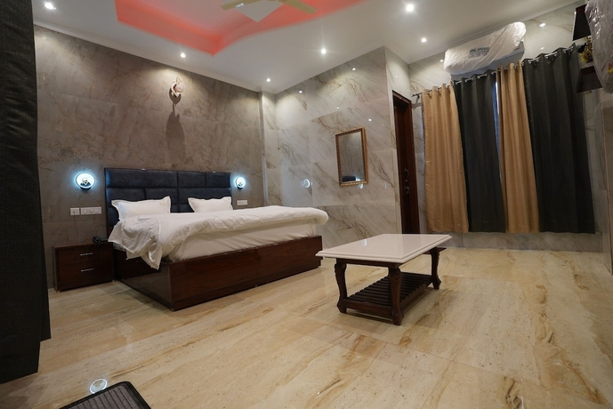 Imagen de la habitación del Hotel Paradise - Chandigarh. Foto 12