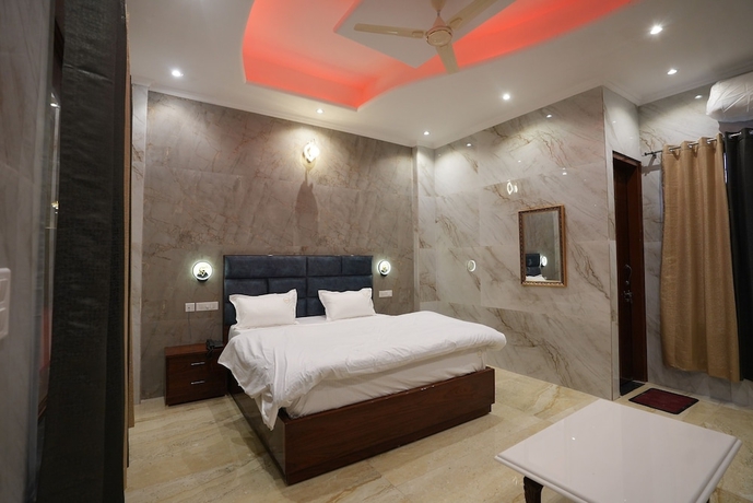 Imagen de la habitación del Hotel Paradise - Chandigarh. Foto 13