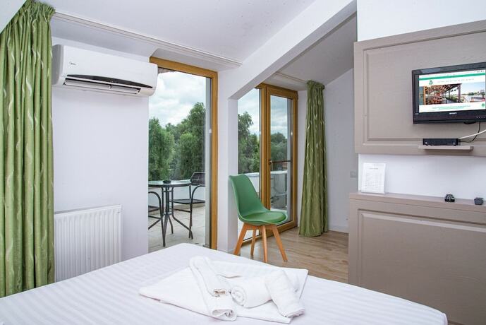 Imagen de la habitación del Hotel Paradise Delta House. Foto 18