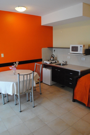 Imagen de la habitación del Hotel Paradise Departamentos. Foto 3
