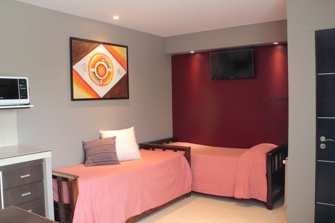 Imagen de la habitación del Hotel Paradise Departamentos. Foto 10