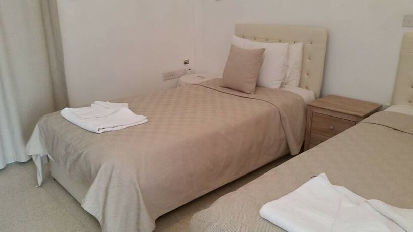 Imagen de la habitación del Hotel Paradise Holiday Bungalows. Foto 17