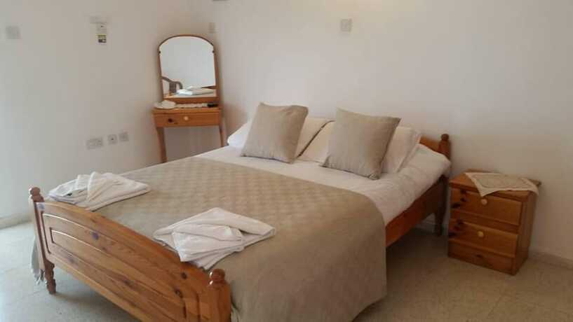 Imagen de la habitación del Hotel Paradise Holiday Bungalows. Foto 19